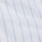 Close-up of a fabric with light blue vertical stripes on a white background