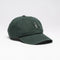 Green baseball cap with a small logo on a light gray background